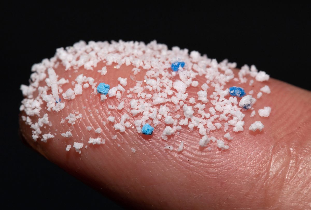 Micro plastic.Small Plastic pellets on the finger.
air pollution