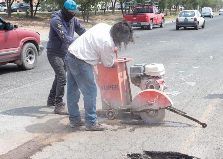 Asentamiento en la carretera México-Pachuca reparado